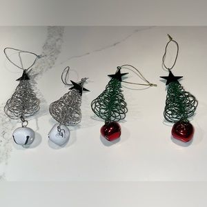 NWOT four metal tree shaped ornaments with bell on the bottom.  Green and silver